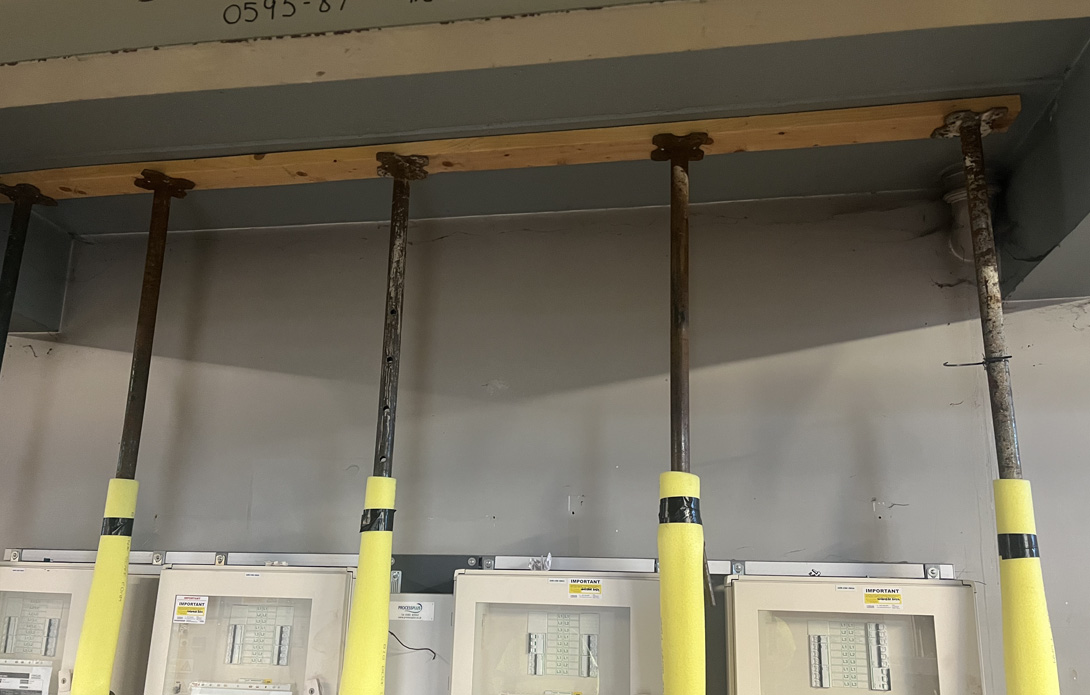 Temporary props supporting the RAAC roof panels during strengthening