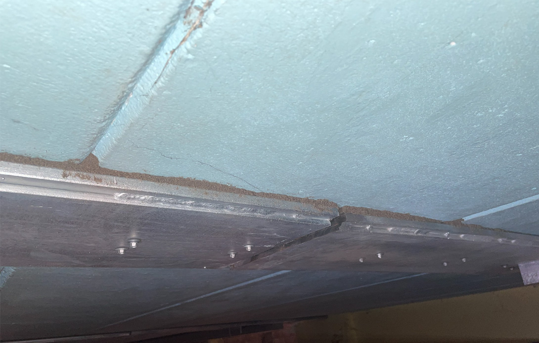 Close-up of a RAAC panel and new support beam