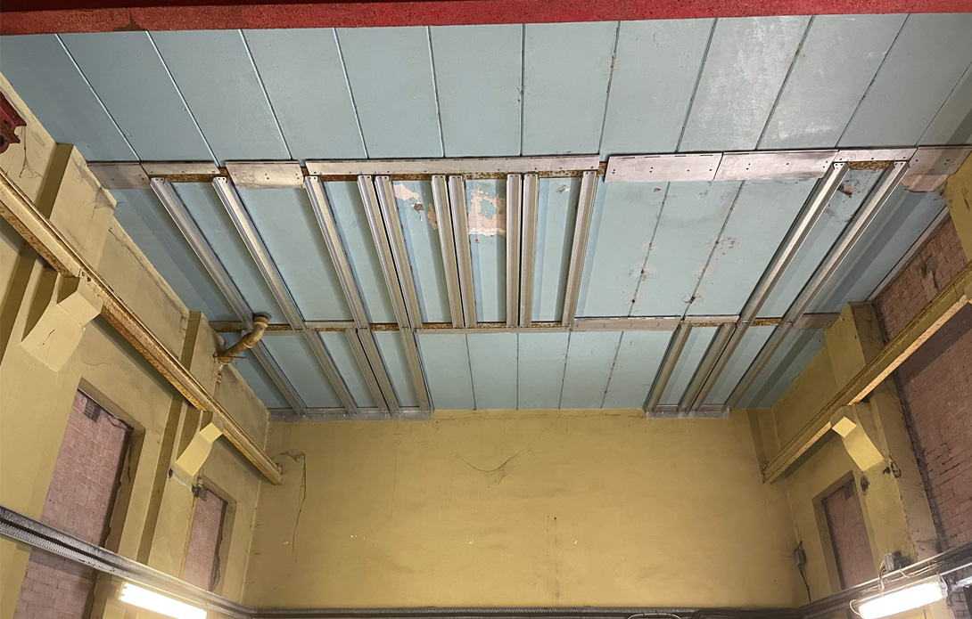New steel support frames installed under the RAAC roof